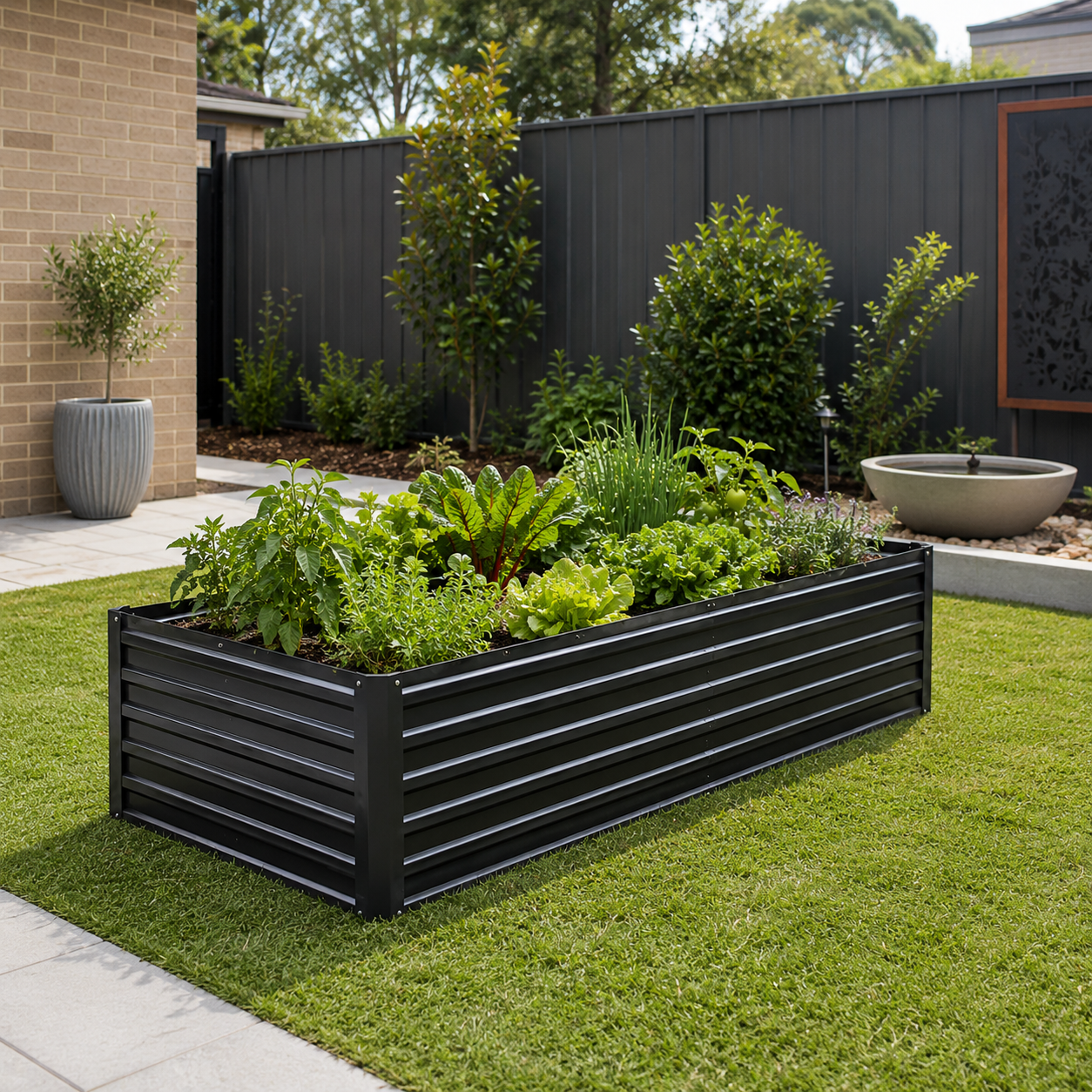 2 in 1 medium steel garden bed with green plants in a backyard setting.