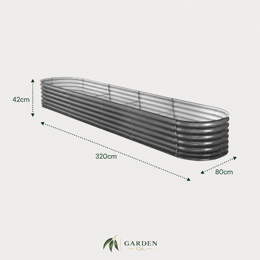 A long, narrow corrugated metal planter bed shown at an angle on a light gray background, with dimension arrows and labels indicating 320 cm length, 80 cm width, and 42 cm height. The Garden Co logo appears at the bottom.