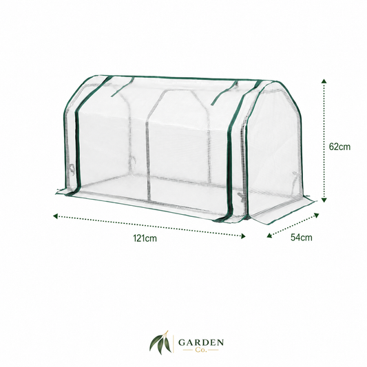 A small greenhouse with a transparent mesh body and dark green trim, shown on a white background with dimension arrows and labels indicating 121cm width, 62cm height, and 54cm depth. The Garden Co logo appears at the bottom.