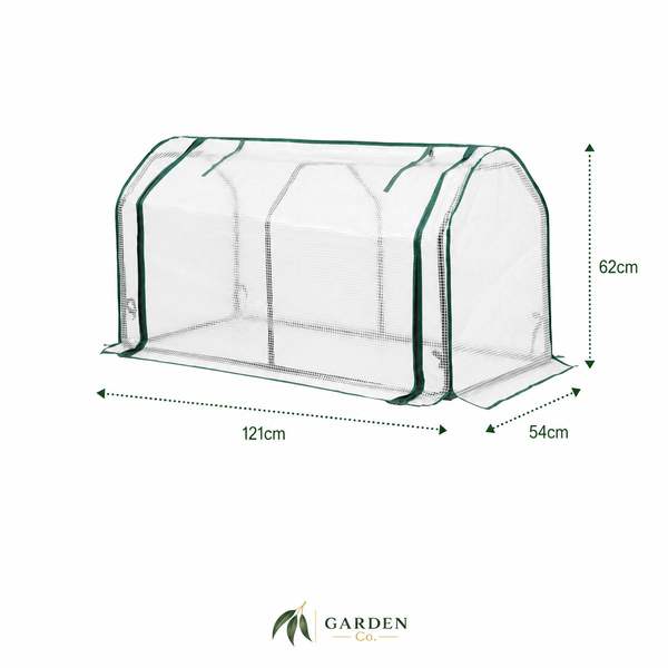 A small greenhouse with a transparent mesh body and dark green trim, shown on a white background with dimension arrows and labels indicating 121cm width, 62cm height, and 54cm depth. The Garden Co logo appears at the bottom.