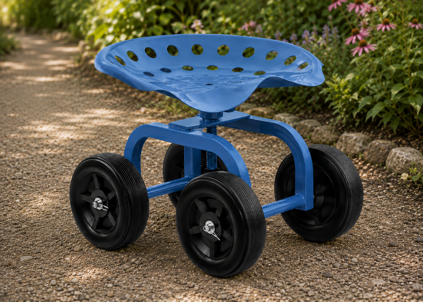 A blue wheeled garden stool with a perforated seat and black wheels, shown on a gravel path in a garden setting.