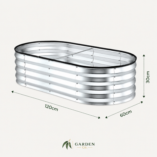 An oval galvanized steel planter with a corrugated metal design, shown with dimension lines indicating its measurements: 120cm in length, 60cm in width, and 30cm in height. The brand logo 'GARDEN CO.