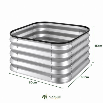 A square corrugated metal garden planter with a black rubber gasket rim, shown with dimension lines indicating 60cm by 60cm by 45cm measurements, on a white background with the Garden Co logo at the bottom.