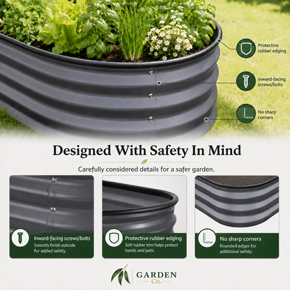 A raised garden bed with green plants on a grassy lawn, shown with callout labels and feature icons explaining safety details like protective rubber edging, inward-facing screws, and no sharp corners. Text reads 'Designed With Safety In Mind' and the Garden Co.